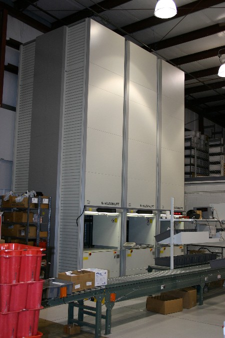 Vertical Lift Parts Distribution, Manufacturing Parts Storage, Vertical Lift Conveyor Storage, Hanel Storage Systems
